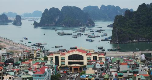 an aerial view of a harbor with boats in the water at Ha Long DC Hotel in Ha Long
