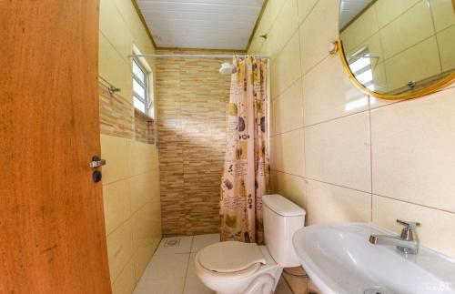 Ванная комната в Pousada Barra da Ferrugem