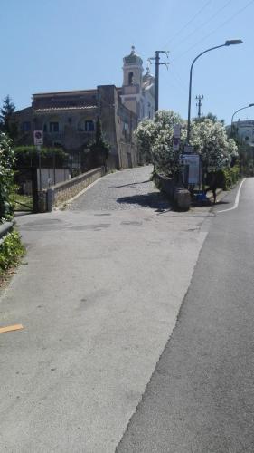 an empty street with a building in the background at Casa Vacanze Li Galli in Sant'Agnello