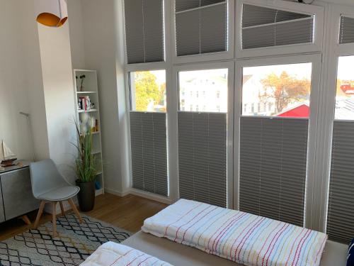 Letto o letti in una camera di Heimathafen am Boddenmarkt