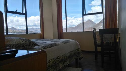 Postel nebo postele na pokoji v ubytování Hostal Inca