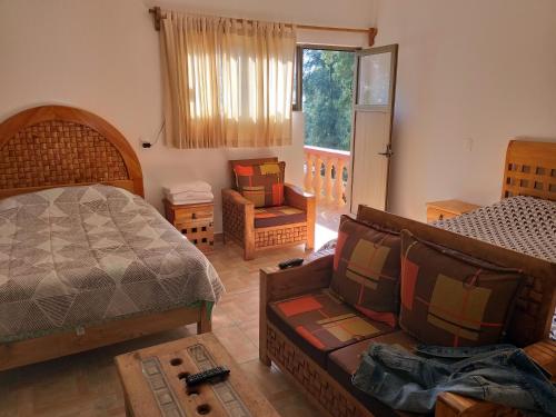 O zonă de relaxare la Hotel Villas Monteli Suites Cuernavaca
