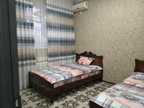 Katil atau katil-katil dalam bilik di Apartment Downtown