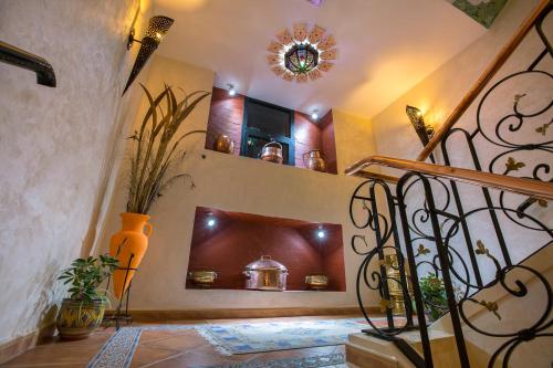 a staircase in a home with a stair case at Atlantic Hotel Agadir in Agadir