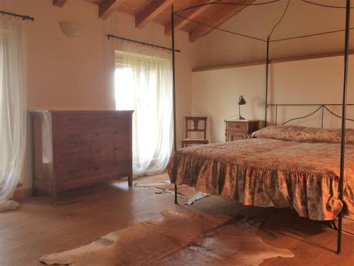 En eller flere senger på et rom på da Luigi al Mulino