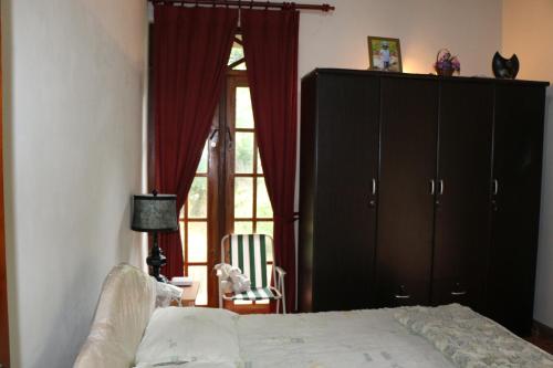 Postel nebo postele na pokoji v ubytování Araliya Home Stay