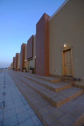 a row of steps leading up to a building at Mnazel Jawraq in Riyadh