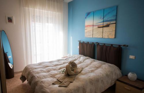 Ένα ή περισσότερα κρεβάτια σε δωμάτιο στο A casa di Simone a Viareggio
