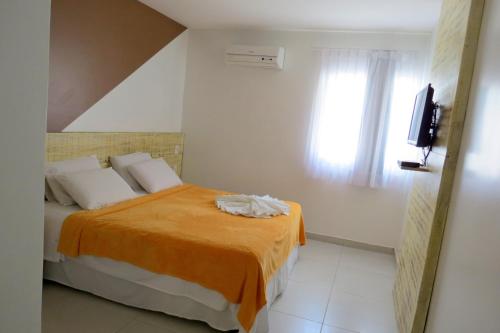 Postel nebo postele na pokoji v ubytování Hotel Encantos de Penedo Alagoas