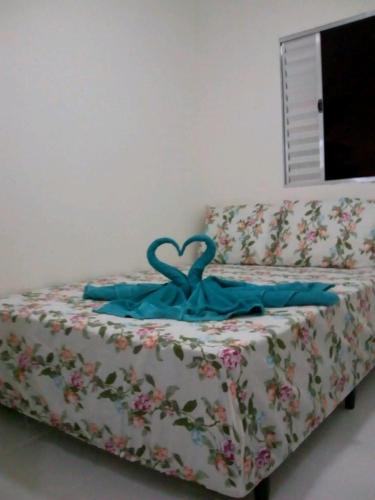 Una cama o camas en una habitación de POUSADINHA Enseada