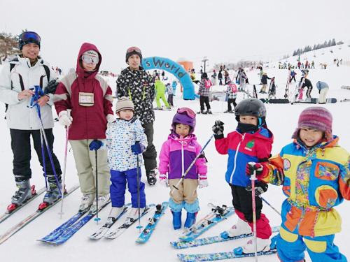 a group of people on skis in the snow at Racine Home Harie in Takashima
