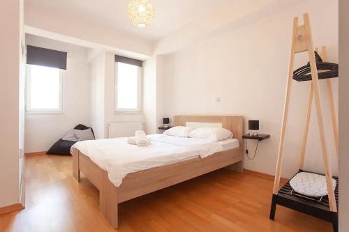 Katil atau katil-katil dalam bilik di Urban Serviced Apartments
