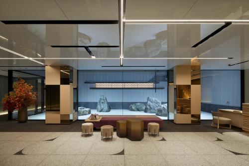 a room with a rock display in a building at Keio Prelia Hotel Kyoto Karasuma-Gojo in Kyoto