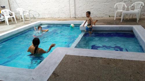 Majoituspaikassa Hotel Neiva Providencia tai sen lähellä sijaitseva uima-allas