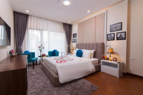 Giường trong phòng chung tại Hanoi Hanvet Hotel