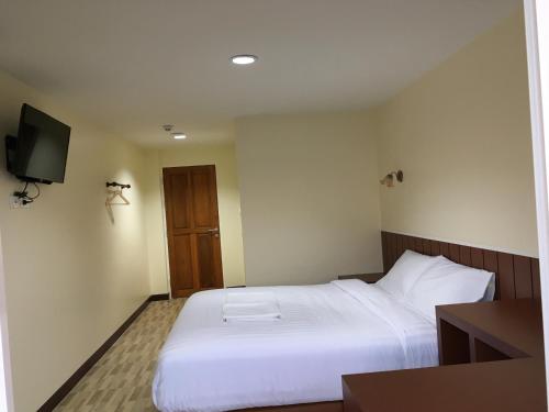 Letto o letti in una camera di Baan Wanchart