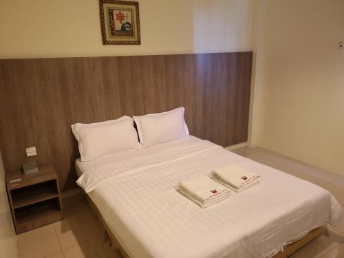 Postel nebo postele na pokoji v ubytování HOTEL AMBASSADOR 1