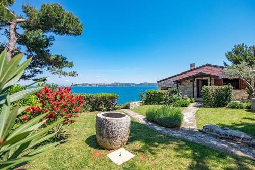 a house with a view of the water at Villa Ana in Savudrija