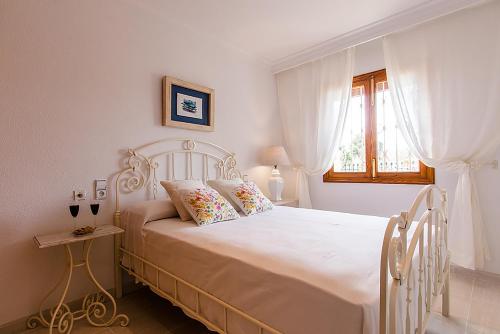 Tempat tidur dalam kamar di Apartment Rosmare