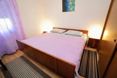 Postel nebo postele na pokoji v ubytování Apartment Cirila