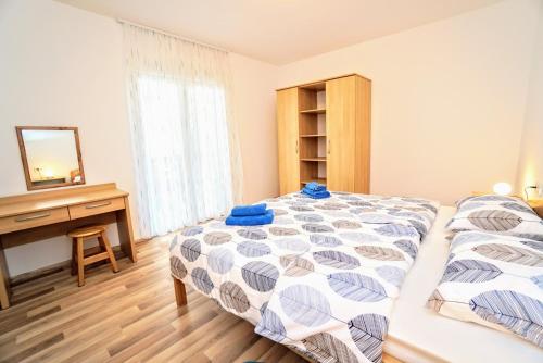 Posteľ alebo postele v izbe v ubytovaní Apartment Nino Savudrija
