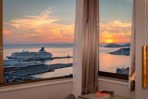 a view of a cruise ship from a window at Royal Suites-Sky in Split