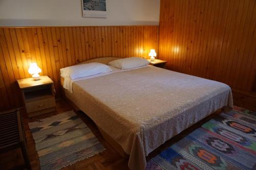 מיטה או מיטות בחדר ב-Apartment Vilma 2
