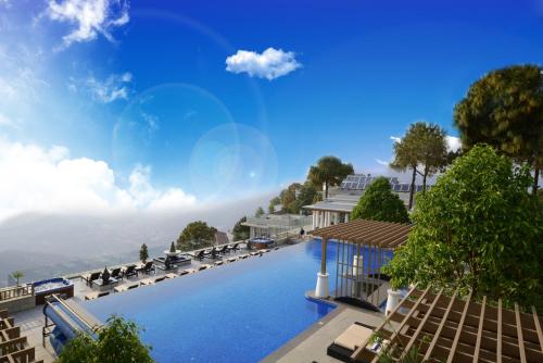 a rendering of a pool at a resort at Moksha Himalaya Spa Resort in Kasauli