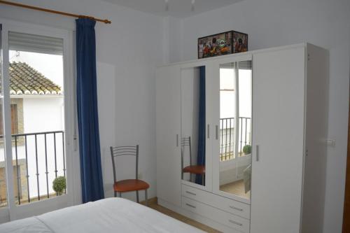 Ένα ή περισσότερα κρεβάτια σε δωμάτιο στο Apartamento Steven
