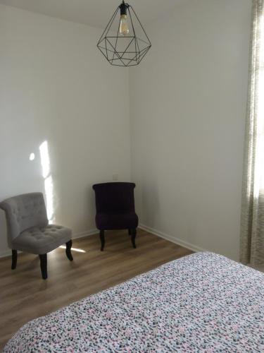 Postel nebo postele na pokoji v ubytování Appartement les Elfes