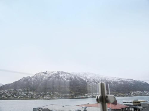 a view of a mountain with snow on it at Radisson Blu Hotel Tromsø in Tromsø