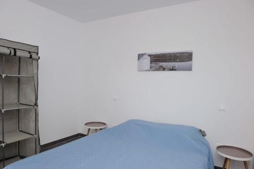 Un pat sau paturi într-o cameră la CHALET CANAVA