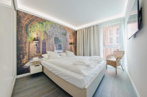 Postel nebo postele na pokoji v ubytování Aura, Sun & Snow