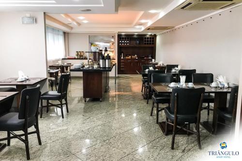 Restoran atau tempat lain untuk makan di Triângulo Apart Hotel