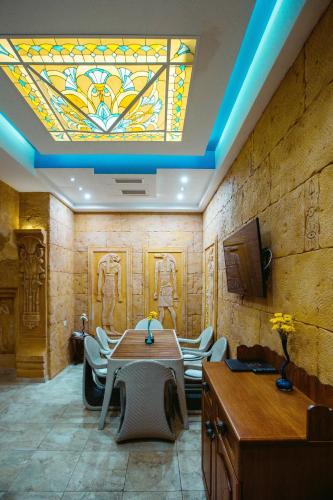 Télévision ou salle de divertissement dans l'établissement Spa Hotel Grace Forum