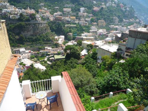 a view of a city from the balcony of a house at Villaverde in Positano