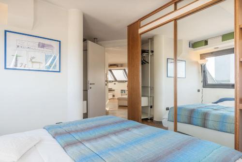 Un ou plusieurs lits dans un hébergement de l'établissement Torlonia Exclusive Penthouse