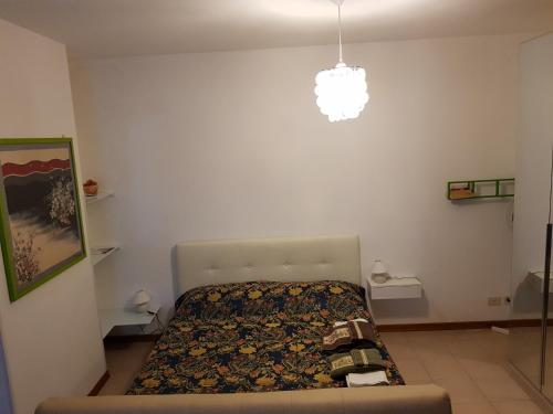 a bedroom with a bed in a room at Casa Nadia in Perugia