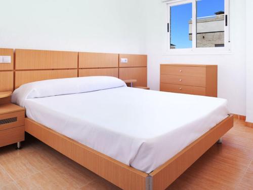 Postel nebo postele na pokoji v ubytování APCOSTAS Torremar - Oropesa