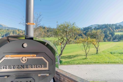 a gas station with a view of a field at Getznerhof in Westendorf