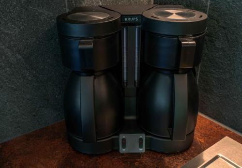 a coffee maker sitting on top of a counter at Getznerhof in Westendorf