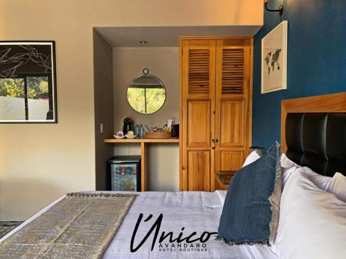 Katil atau katil-katil dalam bilik di Hotel Boutique Unico Avandaro