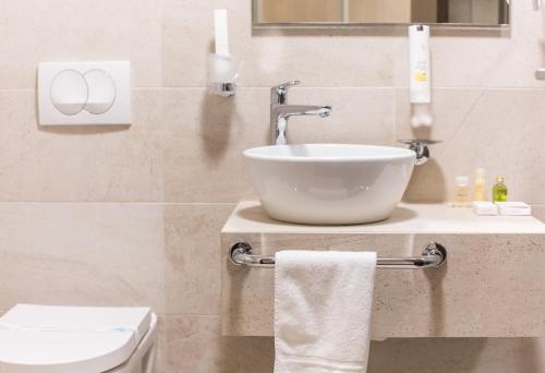 Koupelna v ubytování Hotel Grand Hedonist