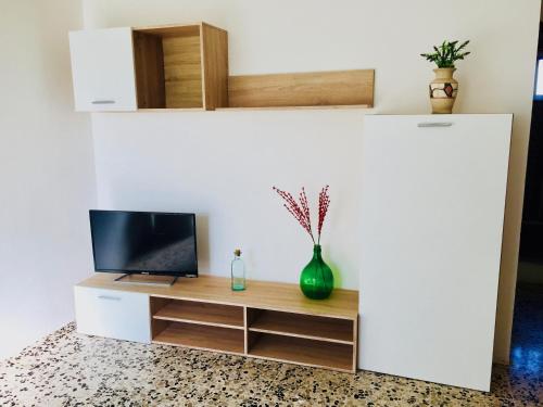 A television and/or entertainment centre at Salento Appartamenti