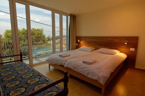 Postel nebo postele na pokoji v ubytování Damask Rose, Lebanese Guest House