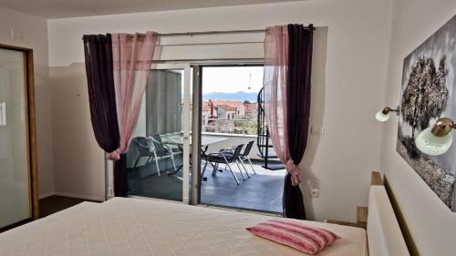 Posteľ alebo postele v izbe v ubytovaní Villa Jela Zadar