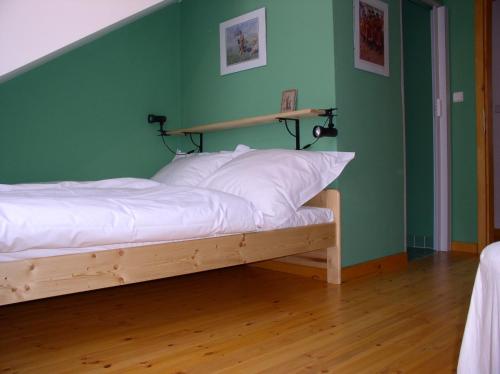 Postel nebo postele na pokoji v ubytování Penzion U maléřa