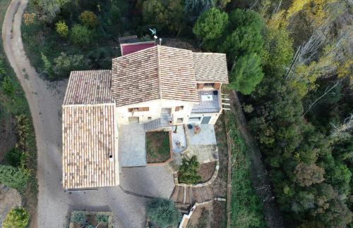 an overhead view of a house with a roof at Maset del Riu in Valderrobres