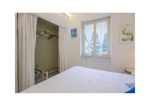 Ένα ή περισσότερα κρεβάτια σε δωμάτιο στο Casa Palomba 41