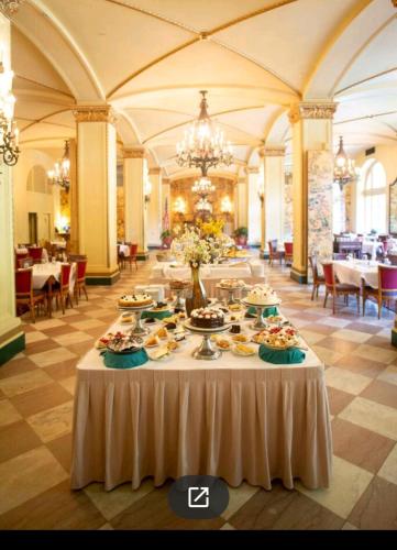 a large room with a table with food on it at Arlington Resort Hotel & Spa in Hot Springs